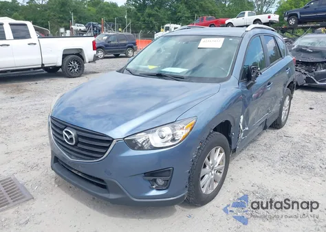 2016 Mazda Cx-5 Touring from USA, damaged, VIN JM3KE4CY4G0690436